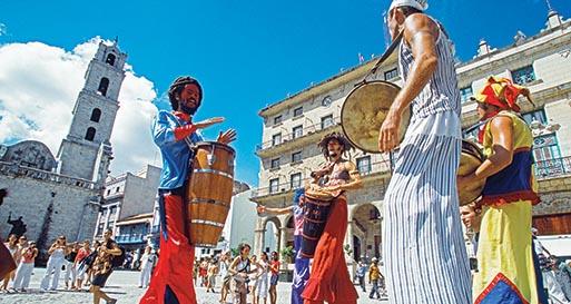 Los Zancudos. Stilt dancers in old Havana World Heritage Area, Cuba
